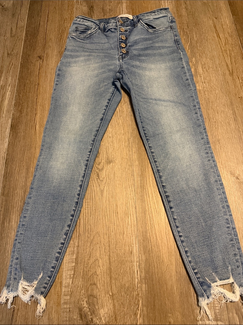 Flying Monkey Women’s Light Blue Button-Fly Distressed Hem Jeans